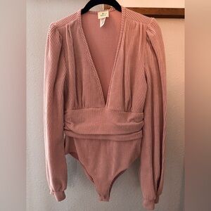 Elegant Pink Ribbed Bodysuit
